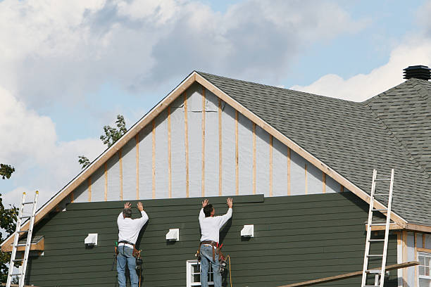 Professional Siding Replacement technician working in Plano, KY